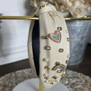 Chic Cream Headband with Vibrant Charms